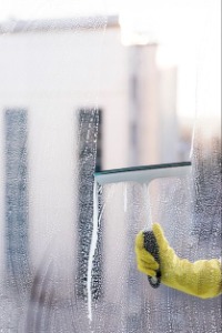Download this Premium photo of Man cleaning window and explore millions of professional stock photos on Freepik_.jpeg